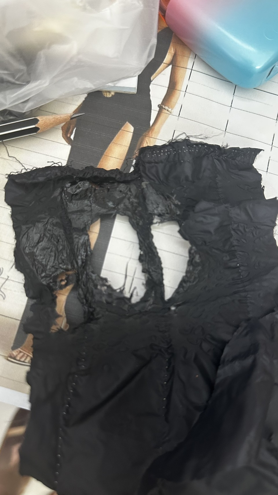 A melted, detached piece of shell fabric