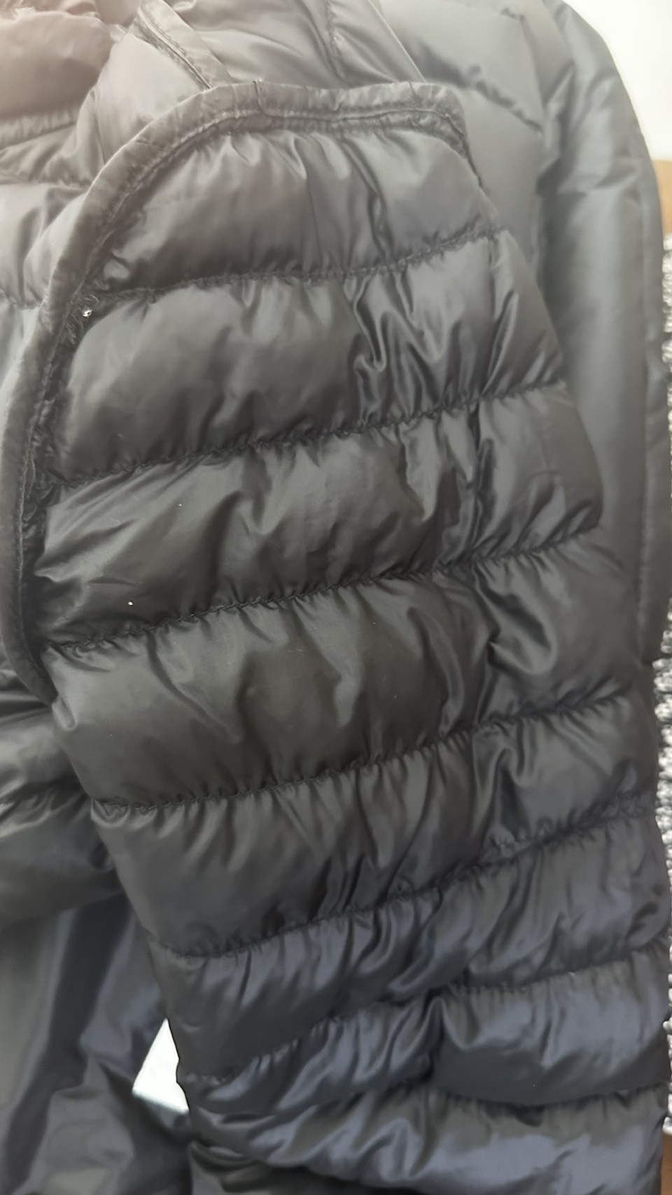 Full view of the black down jacket